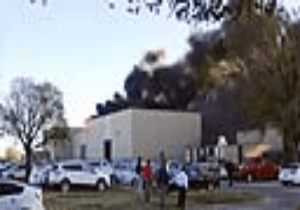 Four die as plane crashes into building in US