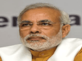 Modi in patch-up mode, meets Advani