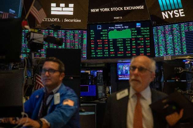 US equities eke out modest weekly gains amid economic data