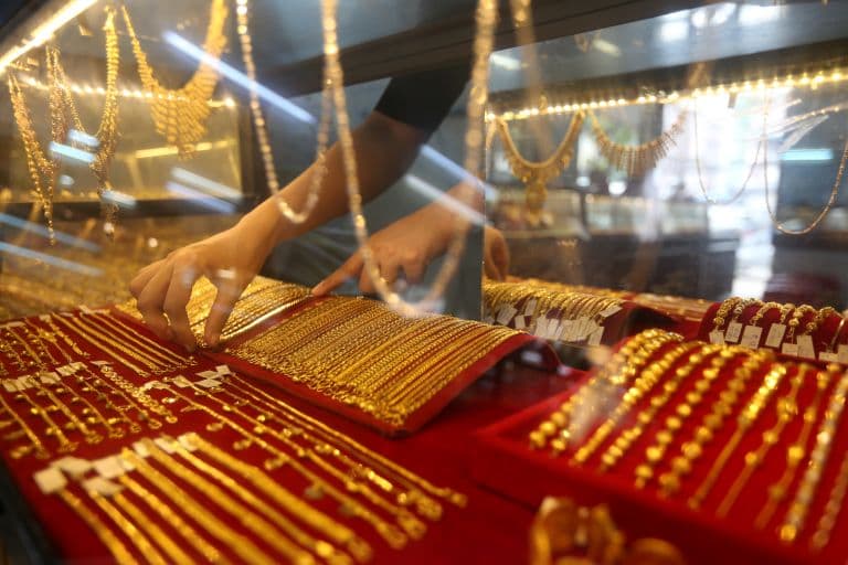 Gold and Silver Prices Slide 7 to 9 percent as Investors Book Profits After Year-Long Rally