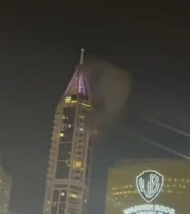 Iranian Missile Debris Hits Dubai Marina Tower, Smoke Seen Rising from Building Facade