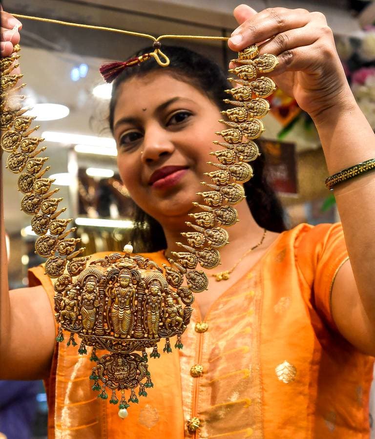 Gold, Silver Prices Open Flat, Slip Slightly Amid Profit-Taking and Stronger US Dollar