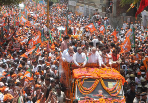 BJP attacks EC over Varanasi curbs, Modi gets grand welcome on visit