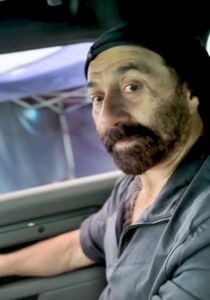 Sunny Deol ‘Drives to Work’ As He Shares a Glimpse of ‘Border 2’ Set In The Hills